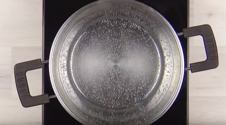 We put a pot of water on the stove and bring to a boil.