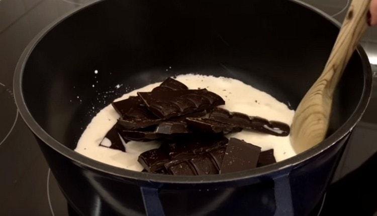 Heat the cream and add dark chocolate to them.