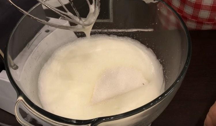 Beat the whites in a light foam.