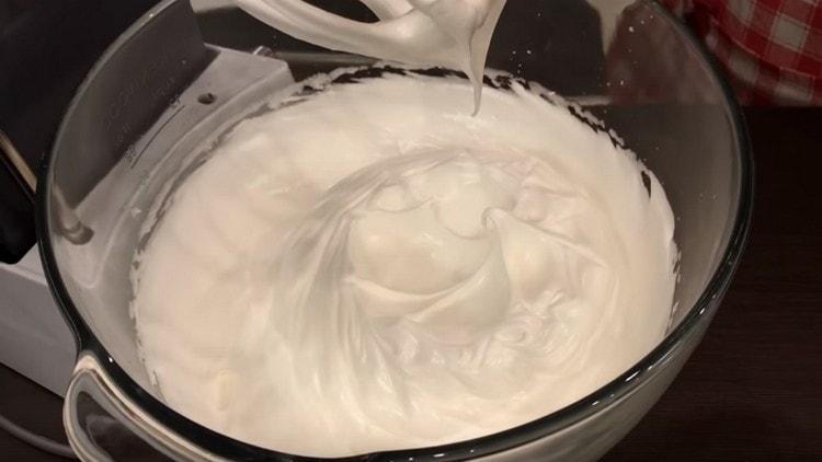 Add sugar to the proteins and beat until stable peaks.