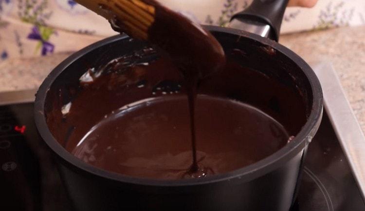 Stirring, cook the icing until sugar is completely dissolved.