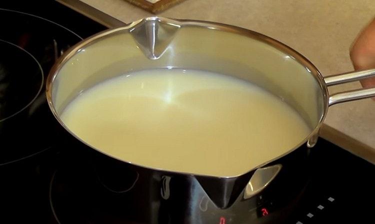 Bring the milk to a boil.