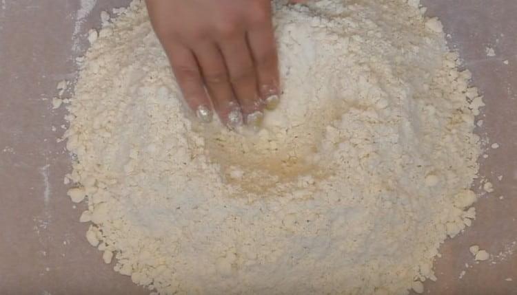 We collect the crumbs up the hill and make a recess in it.