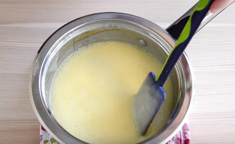 Boil the mass over the fire with constant stirring.