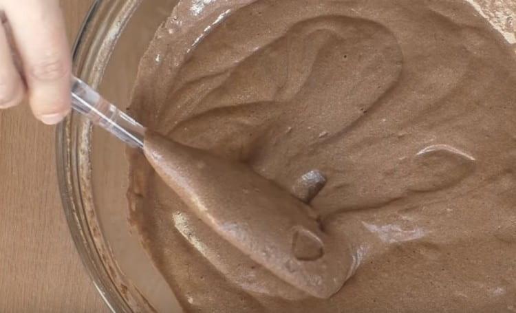 Gently mix the mass with a whisk, achieving a homogeneous consistency.