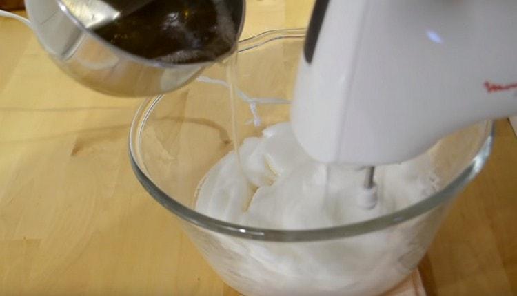 Carefully, in a thin stream, we introduce syrup into the proteins.