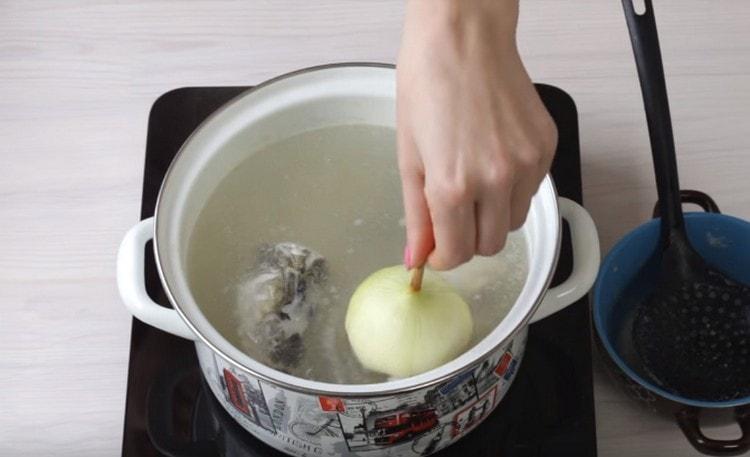 We put a whole onion into the broth.