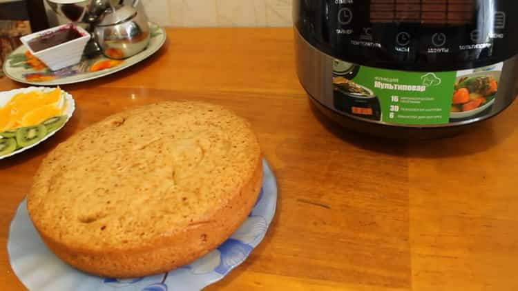 To prepare a honey cake in a slow cooker, cool the biscuit