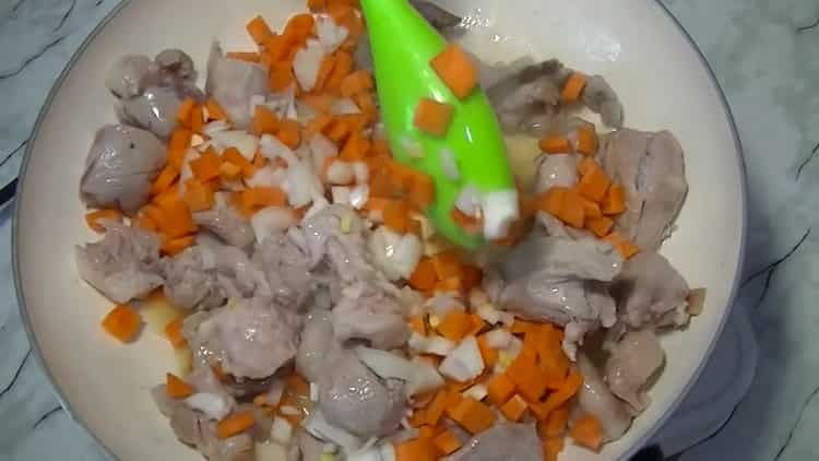 Sauté the ingredients for cooking