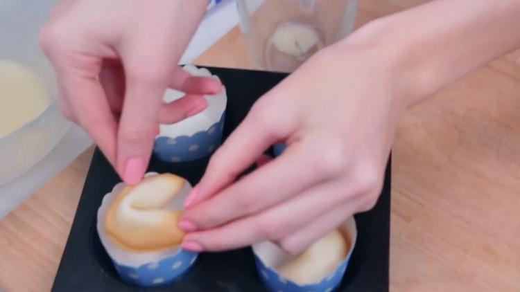 To make fortune cookies, put the cookies in the shape