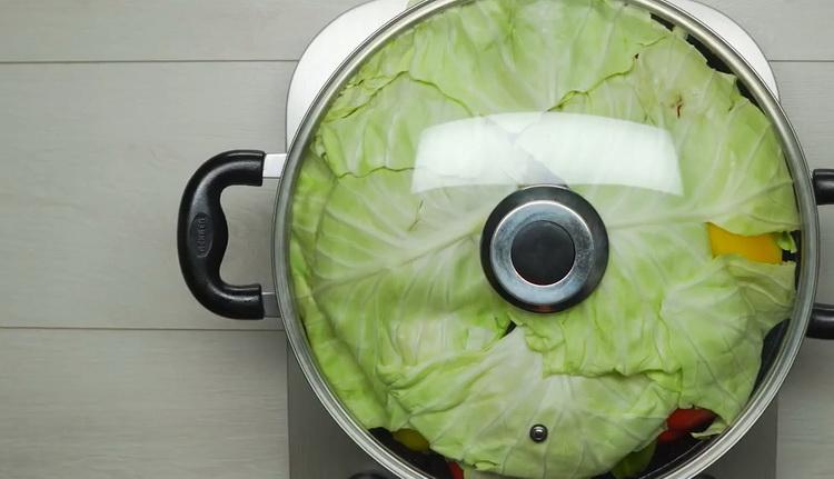 To cook a vegetable stew with meat, put the pan on the fire