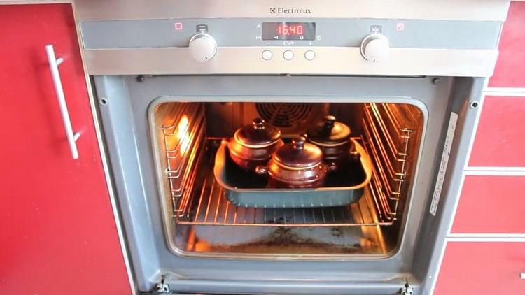 To cook beef in pots with potatoes in the oven, preheat the oven
