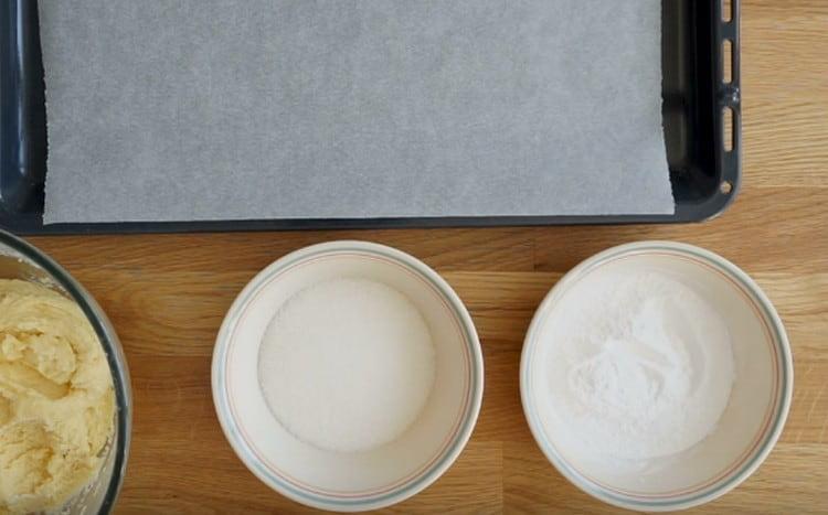 Pour sugar and icing sugar into separate bowls.
