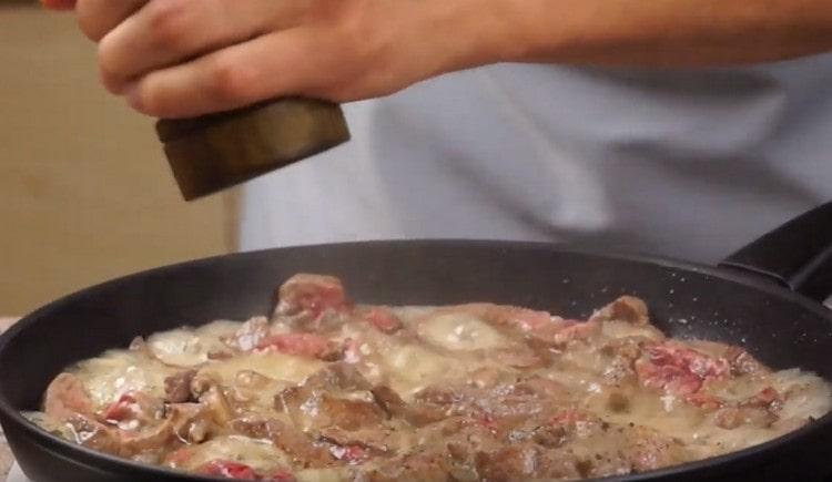 Salt and pepper the dish.