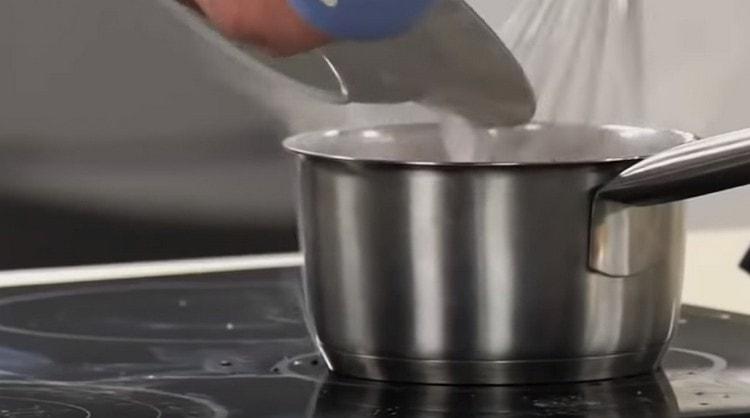 Into boiling chocolate we introduce starch with constant stirring.