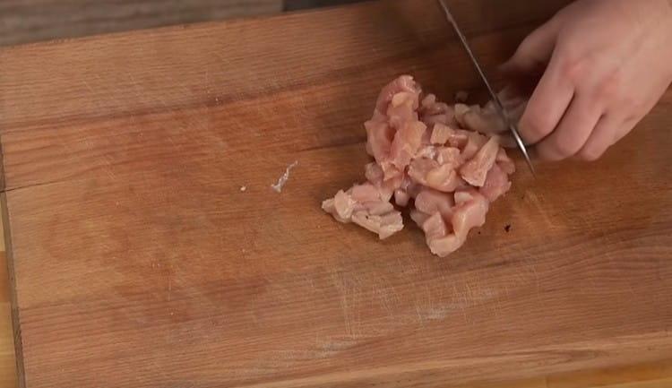 Dice the chicken.