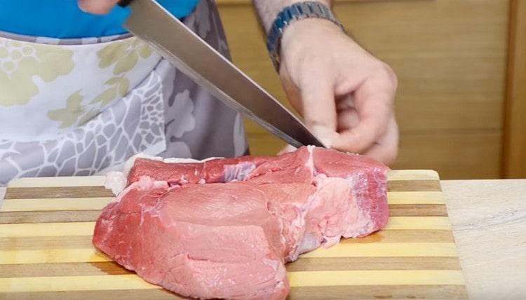 We release meat from films and excess fat.