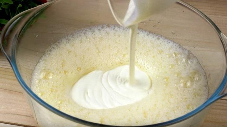 Add sour cream and mayonnaise to the dough.