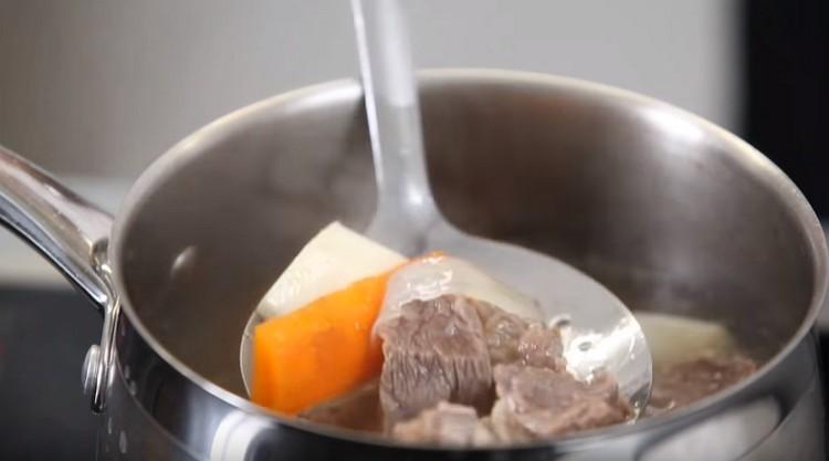 Boil beef with vegetables until tender.