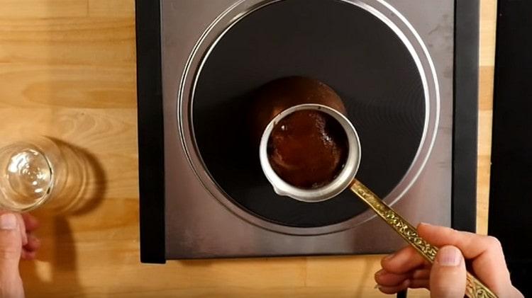 We put the Turk on the stove and wait for the cap to begin to rise on it.