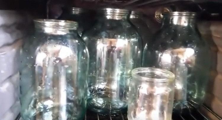 We sterilize the cans in the oven.