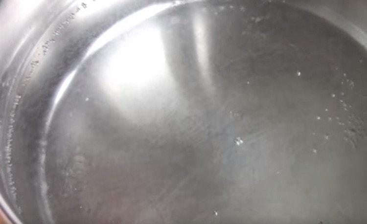 In a saucepan, bring the water to a boil.