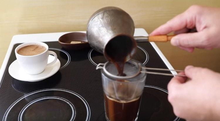 Filter the drink through a strainer.