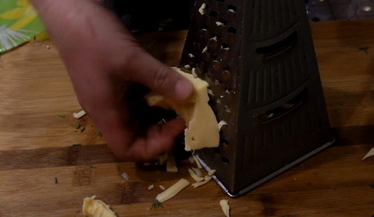 Grate hard cheese.