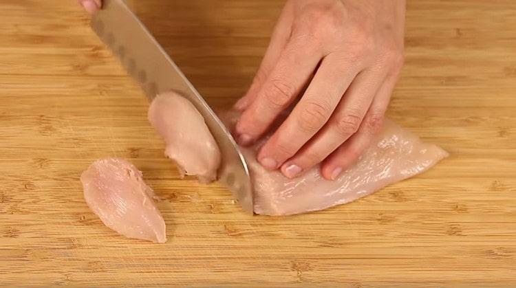 Cut the chicken into approximately equal pieces.