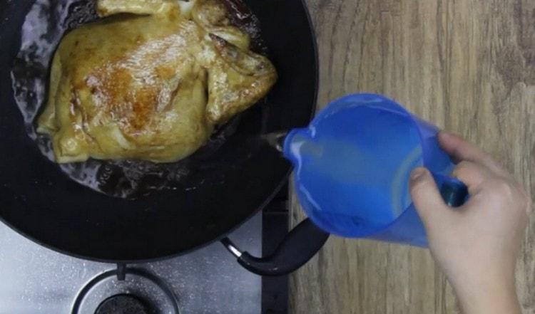 Add water to the pan and cover.