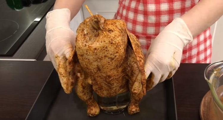 Carefully push the carcass onto the jar.