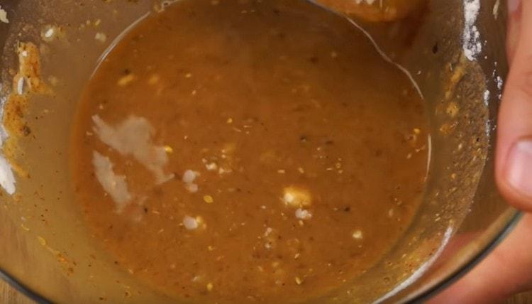 Add pepper, paprika, as well as a spoonful of flour and mix.