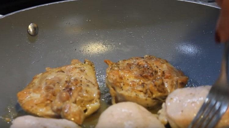 Fry the thighs on each side until golden brown.