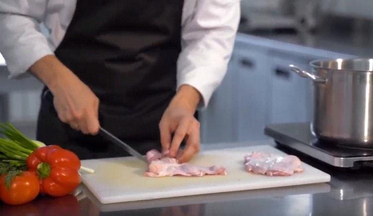 Cut the chicken into pieces.