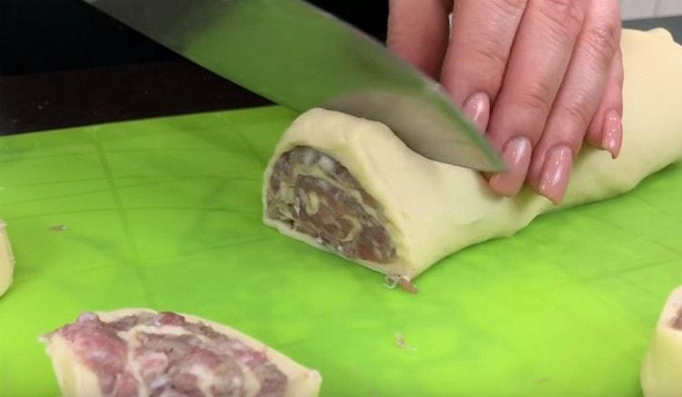 Cut the roll into pieces.