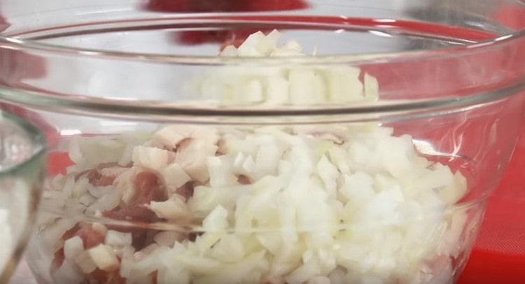 Combine onion with meat.