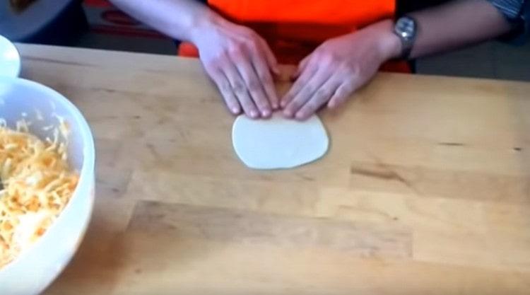 Roll each blank into a square, crush its edges.