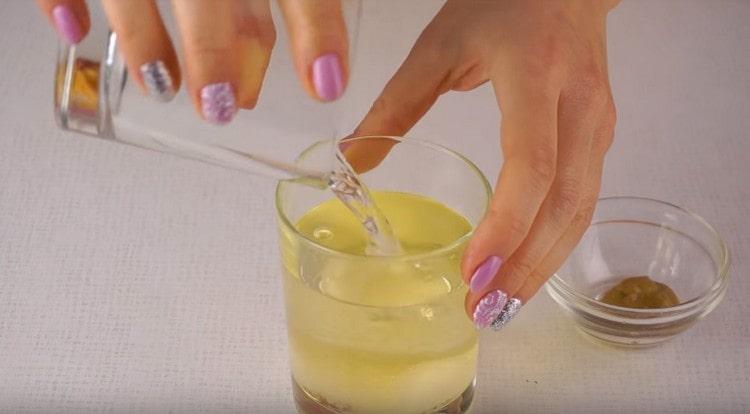 To prepare the marinade, combine vegetable oil with vinegar.