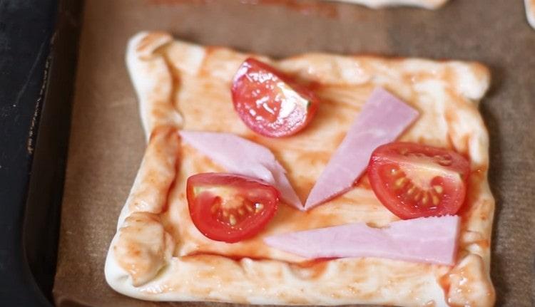 Next, add the slices of ham.