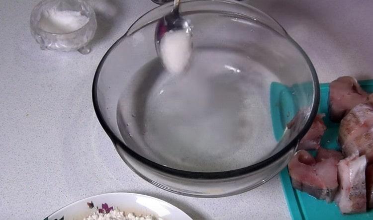 Dissolve sugar and salt in water.