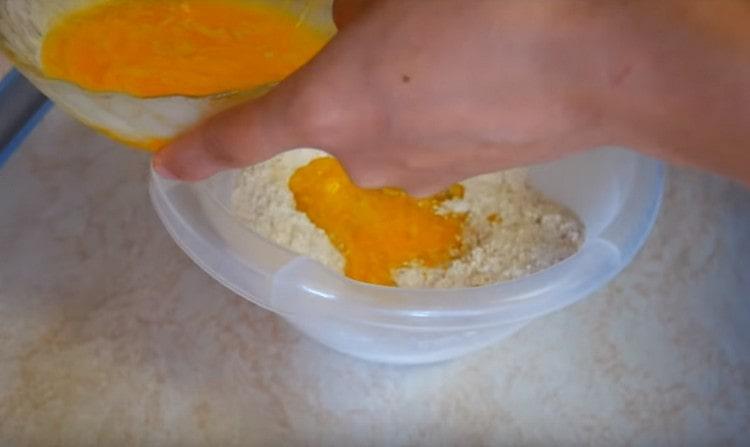 Gradually add the liquid part to the dry components.