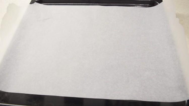 Cover the baking sheet with parchment.