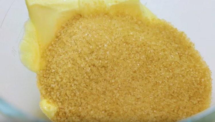 Add the egg and sugar to the butter.