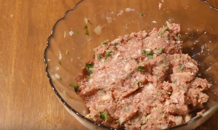 Stir the minced meat thoroughly for juiciness; you can add a little water.