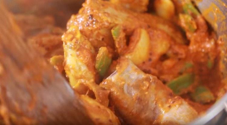 In the pan, thoroughly mix all the components of the dish.