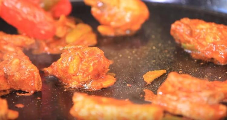 We put the meat in a pan.