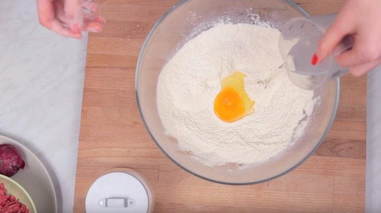 Add water and start kneading the dough.