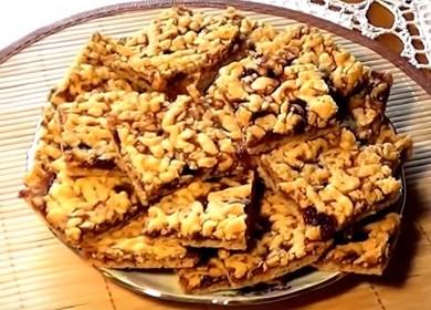 Cooking a delicious and simple shortbread cookie with jam and crumbs at home according to the recipe with a photo.
