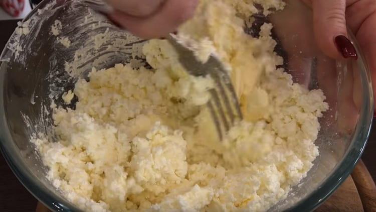 Knead the cottage cheese with butter until smooth.