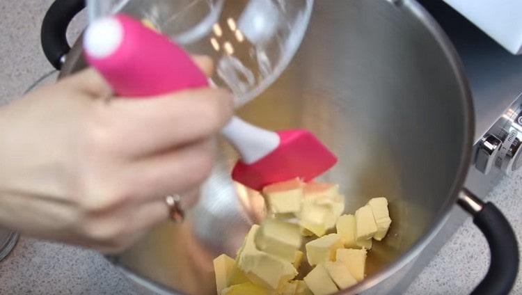 Put the softened butter in a bowl.